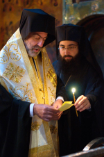 Priest reading names